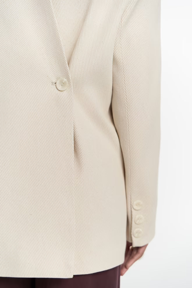 The off-white cotton blazer